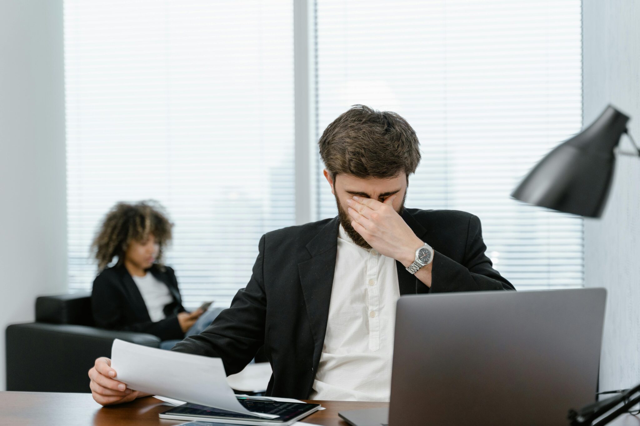 a man looking worried in an office